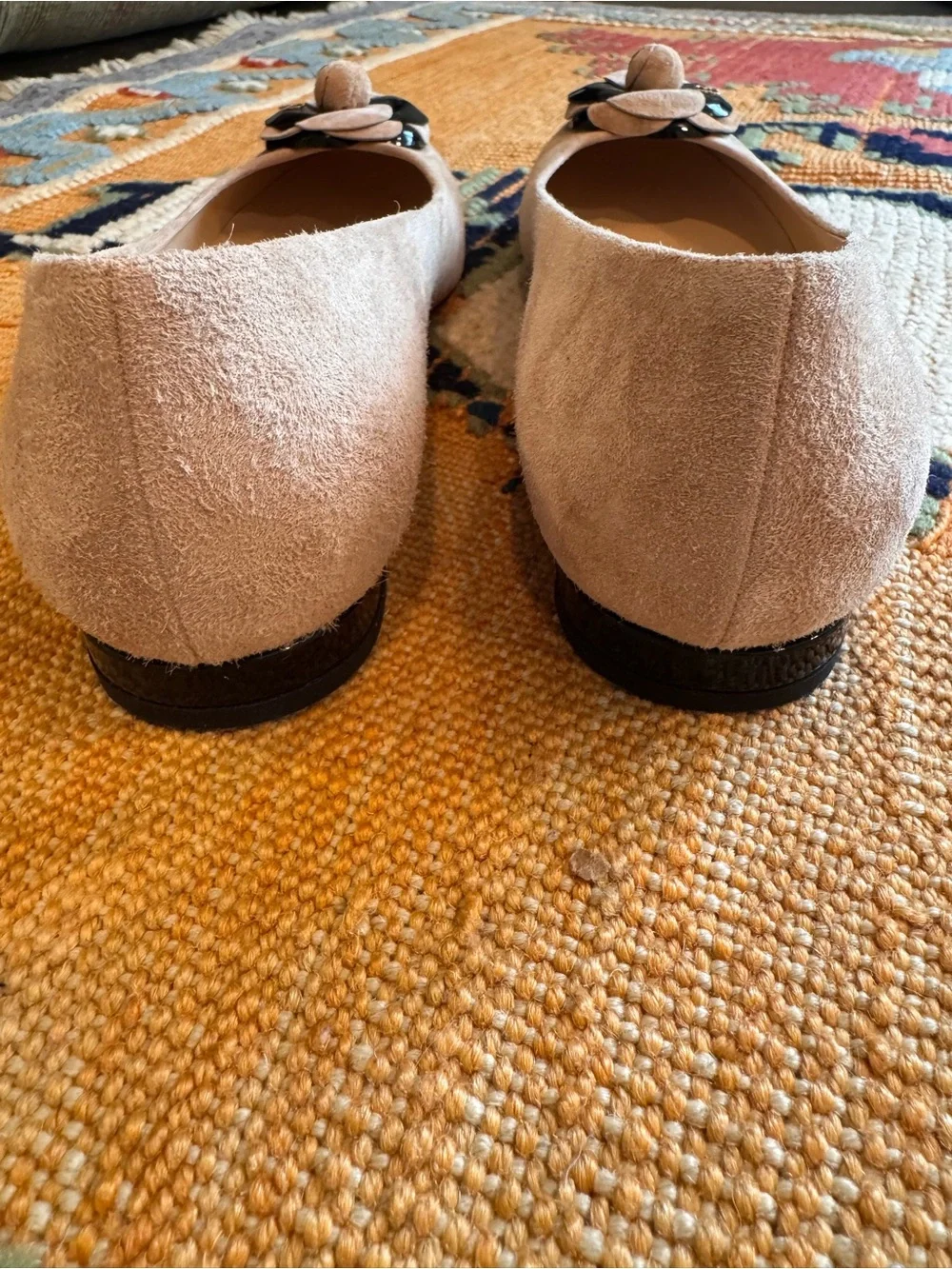 CHANEL Beige Suede Camellia-Embellished Ballet Flats with Black Accents